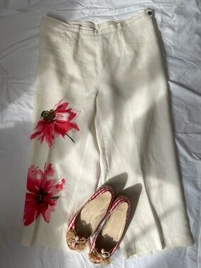 Off-white linen pants with print floral detail